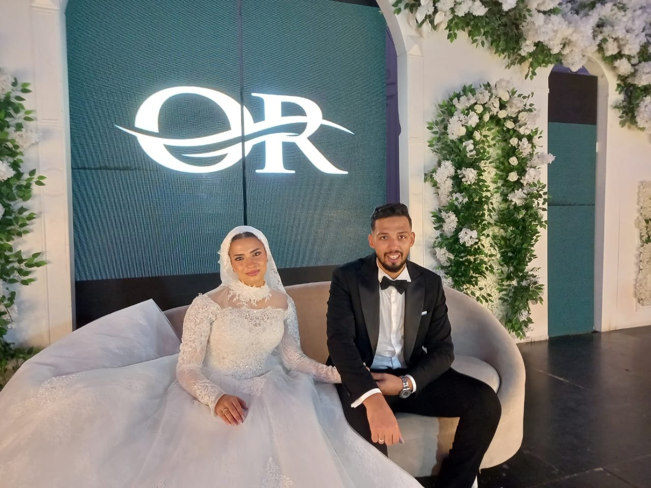 العروسان المهندس "خالد جمال" والآنسة "منة الله هانى"